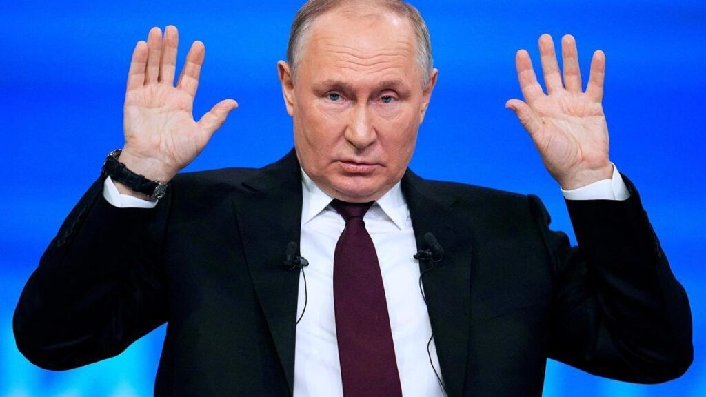 Putin manos levantadas