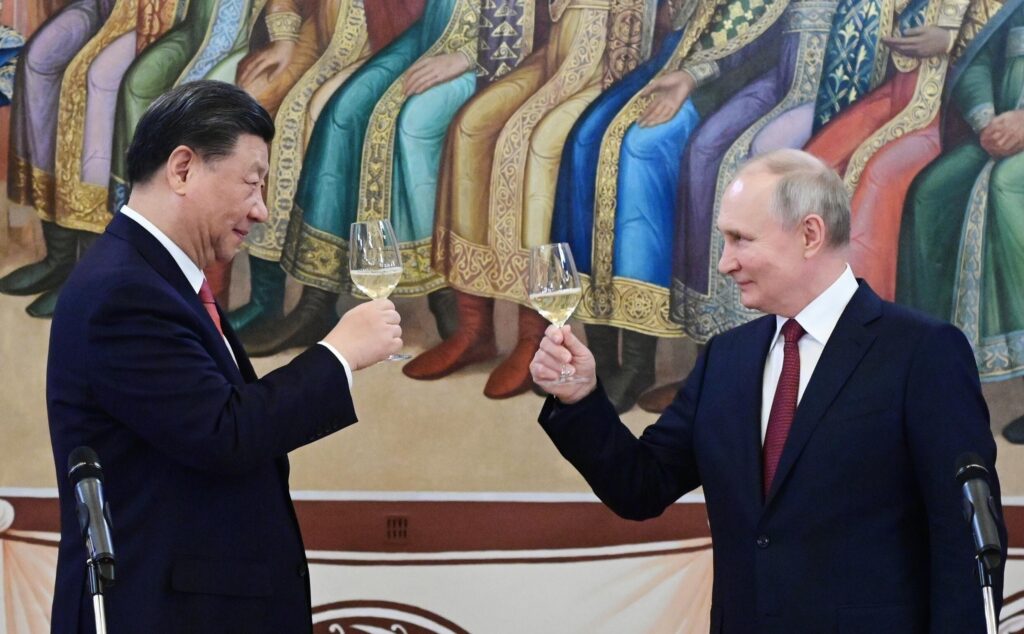 Xi Putin brindan