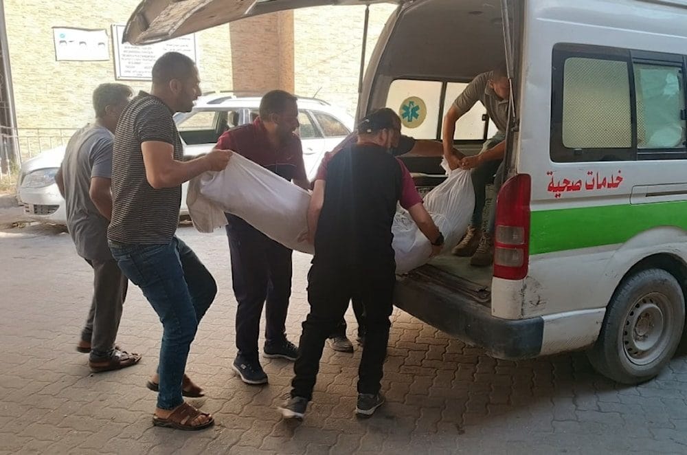 Muerto metido en ambulancia