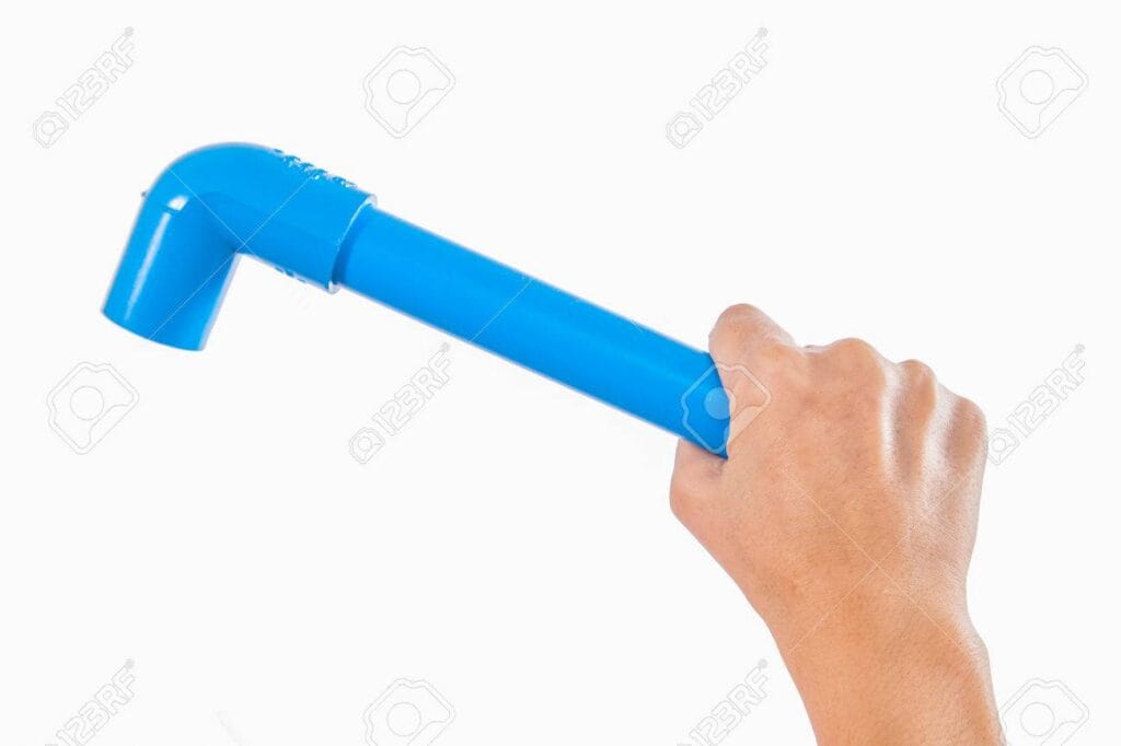 hand holding a PVC pipe